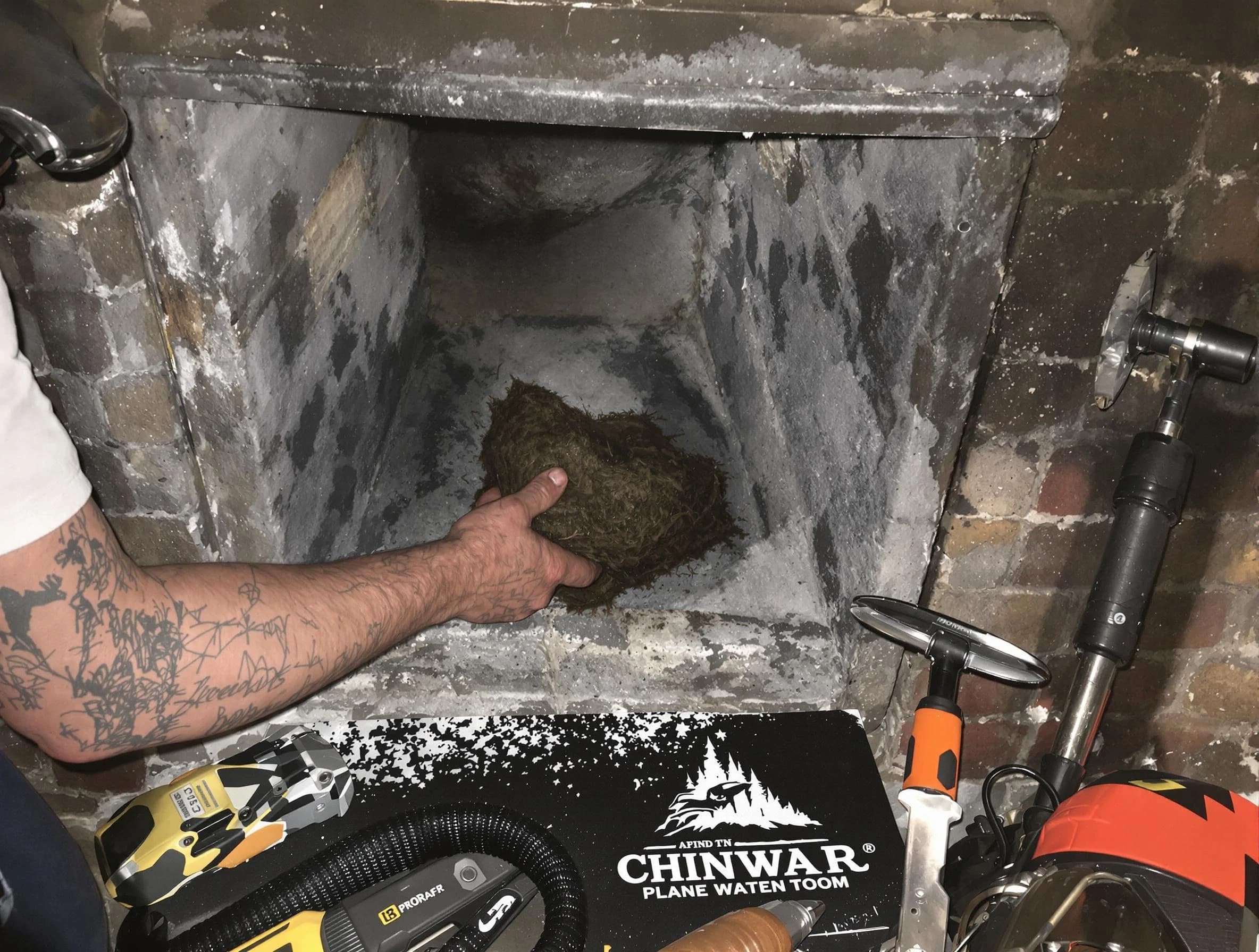 Hillside Chimney Sweep safely removing debris and screening chimney in Hillside, NJ